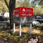 V-shape Cushman and Wakefield 4x4 Sign with Posts