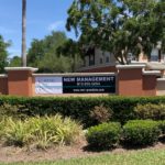 Installed Grand Isle Apartments New Management Banner