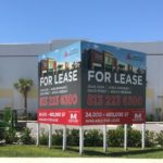 Digitally Printed 4x4 Cushman and Wakefield Signs with Posts